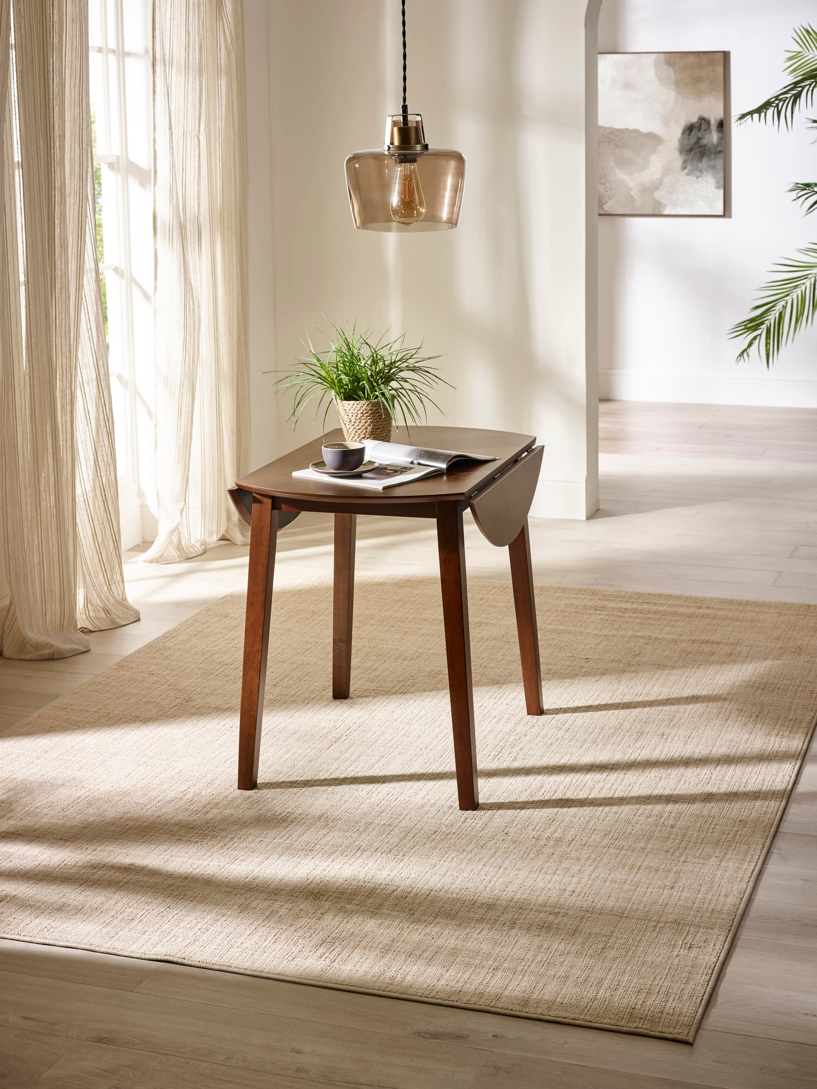 Coast Walnut 55- Drop Leaf Extending Round Dining Table – Walnut Effect