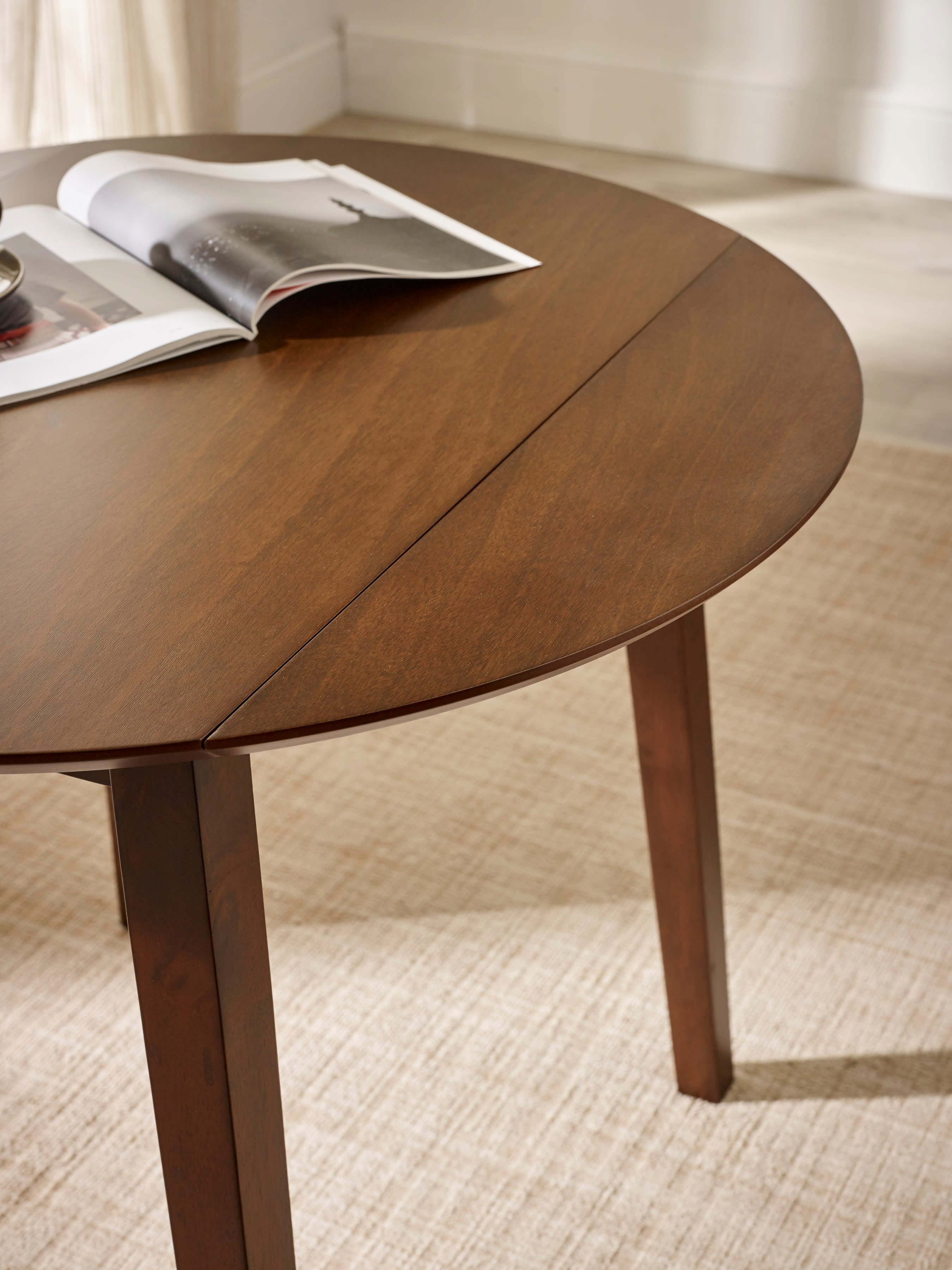Coast Walnut 55- Drop Leaf Extending Round Dining Table – Walnut Effect