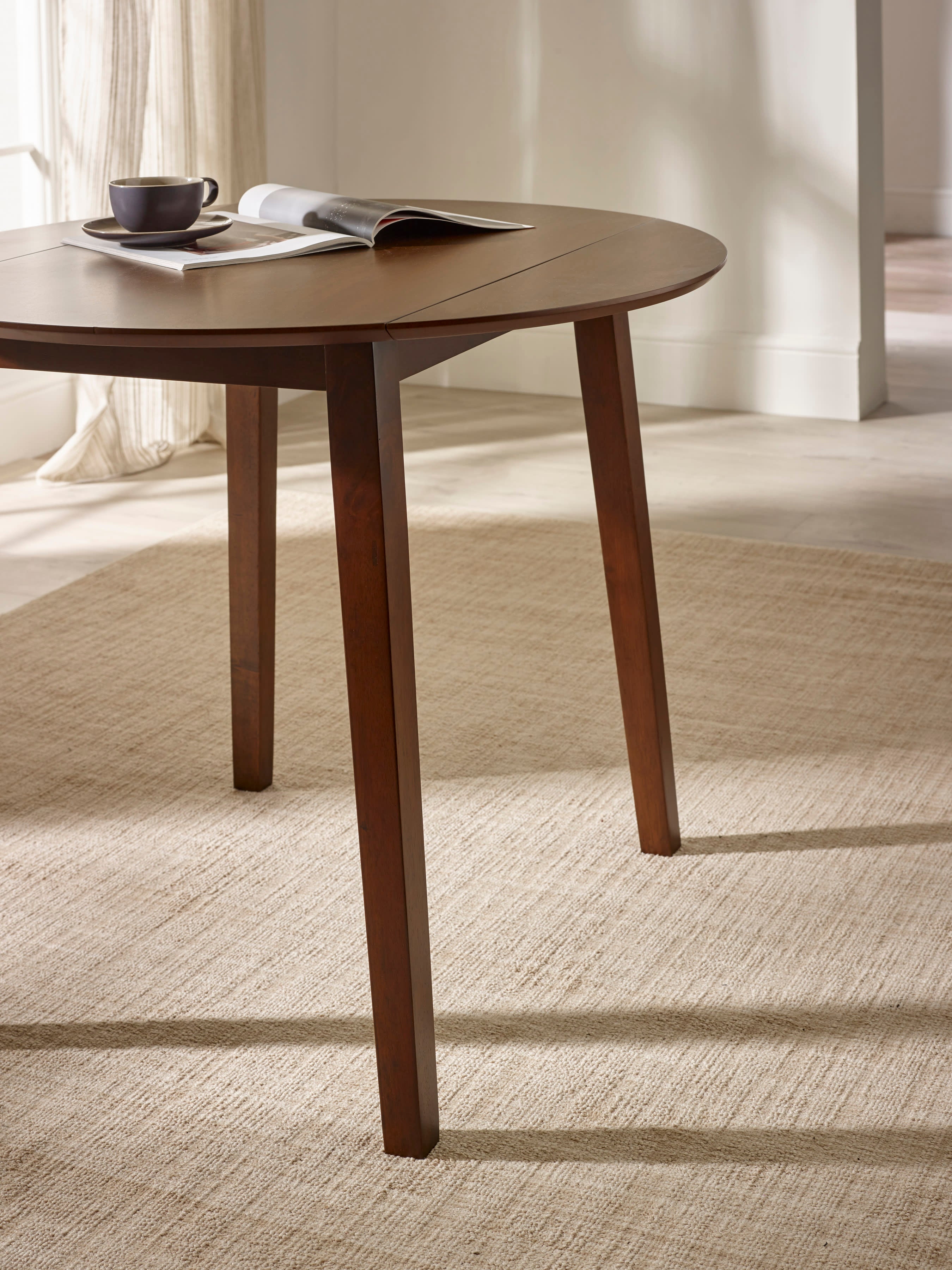 Coast Walnut 55- Drop Leaf Extending Round Dining Table – Walnut Effect