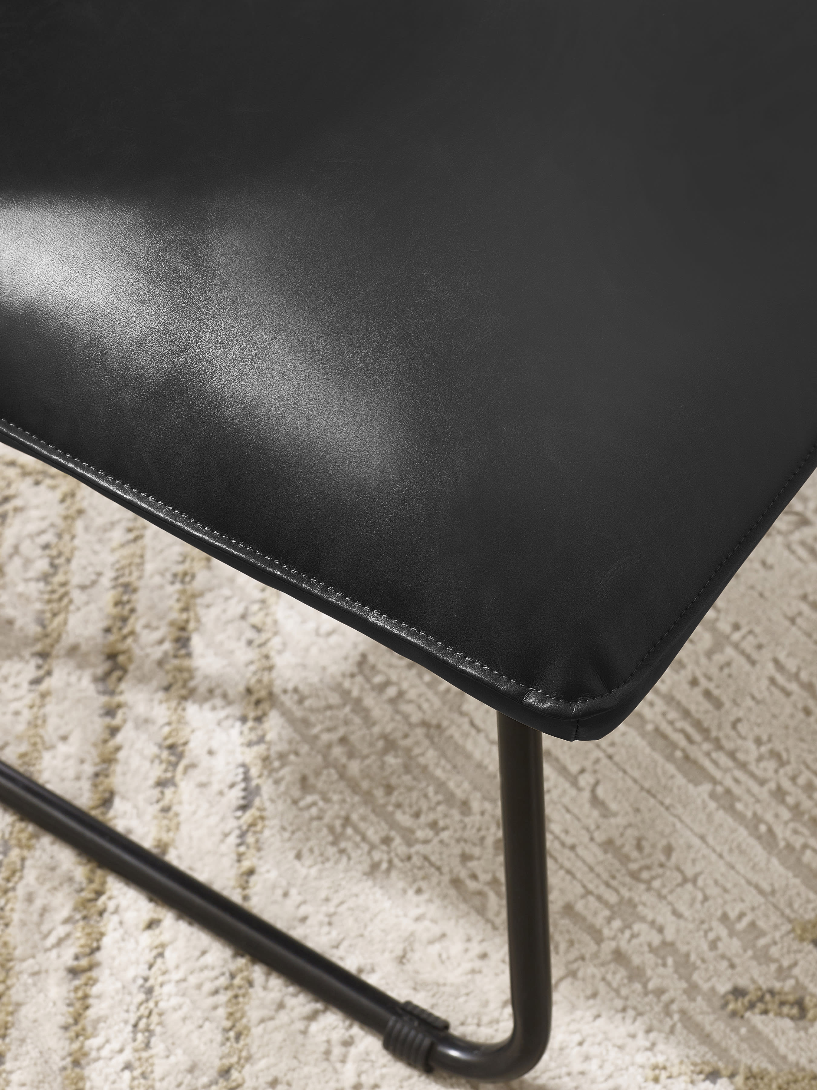 Saxon Black Faux Leather Lounge Chair