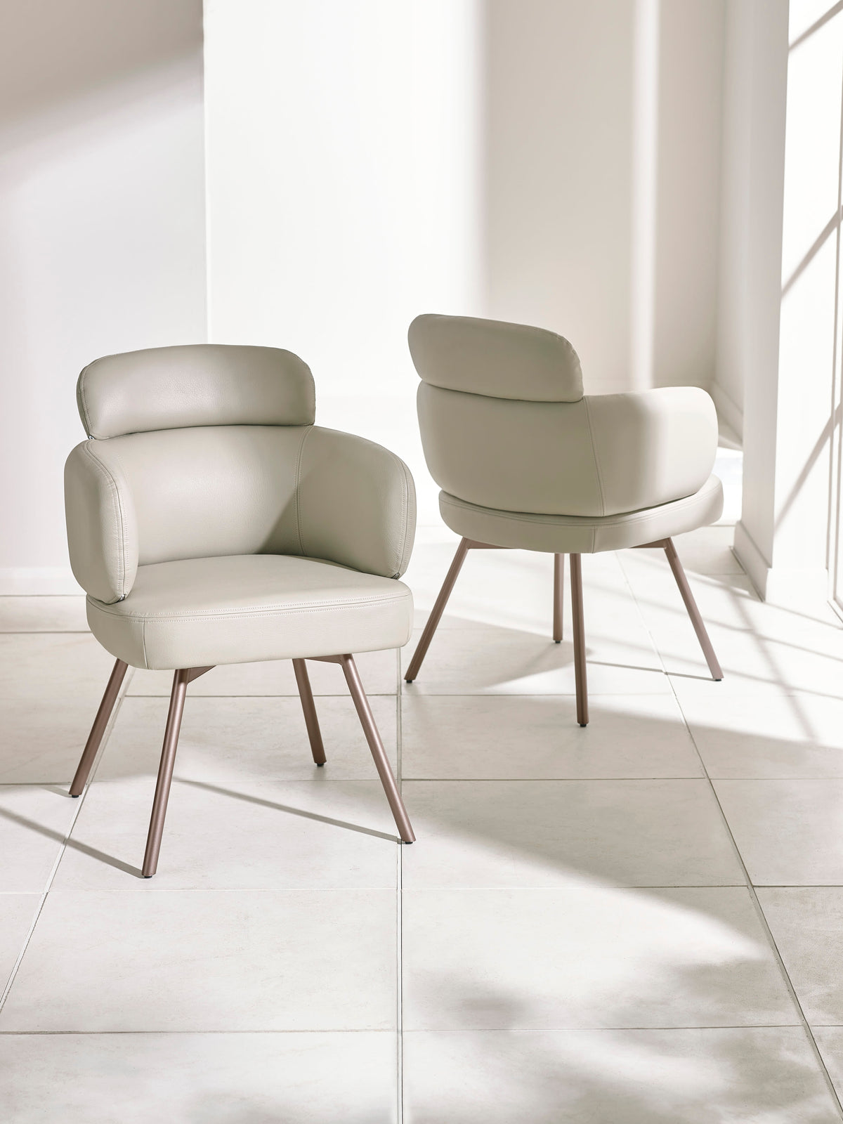 Set of 2 Callisto Beige Faux Leather Swivel Dining Chairs – Taupe Faux Leather and Brushed Bronze