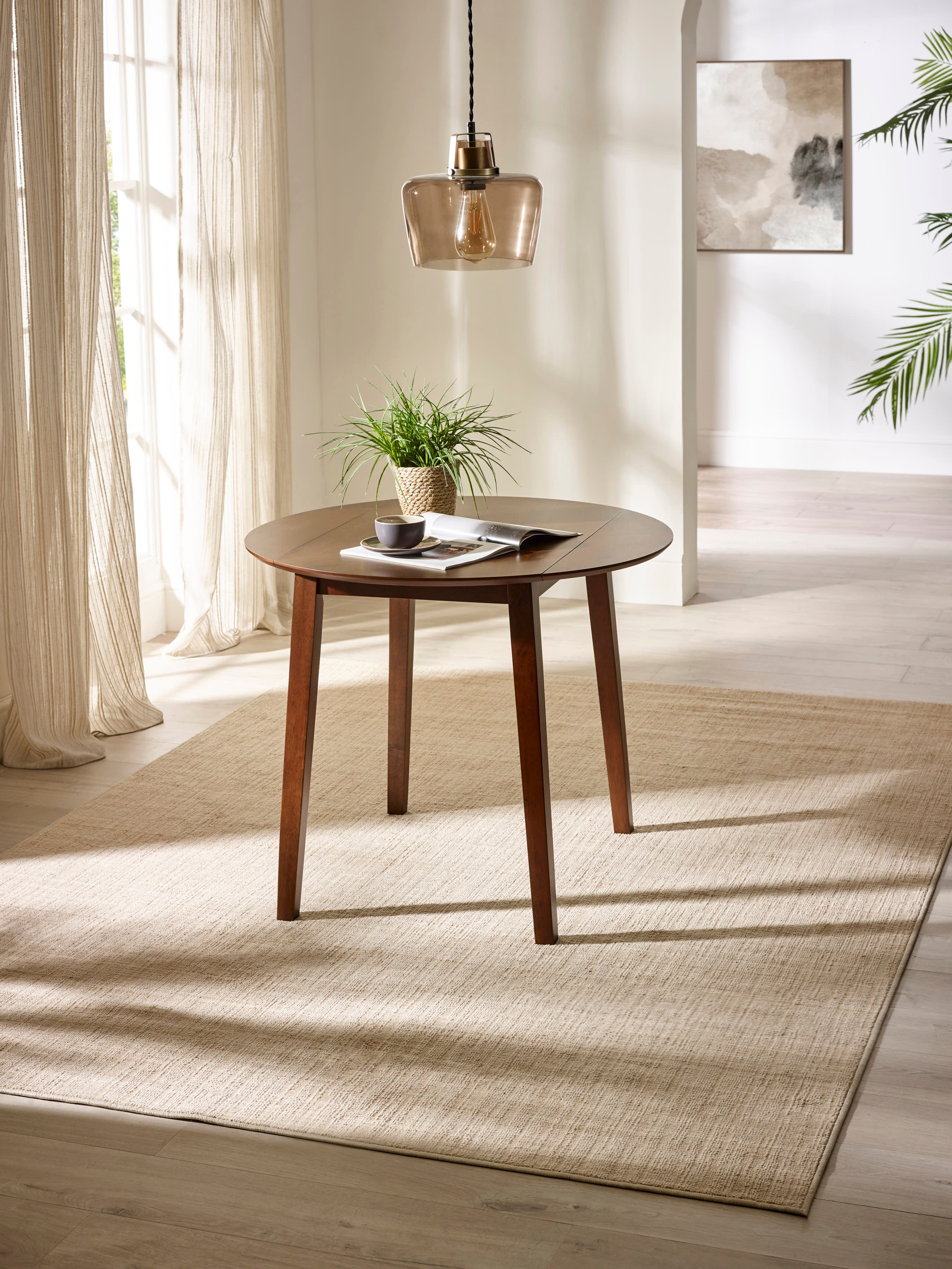 Coast Walnut 55- Drop Leaf Extending Round Dining Table – Walnut Effect