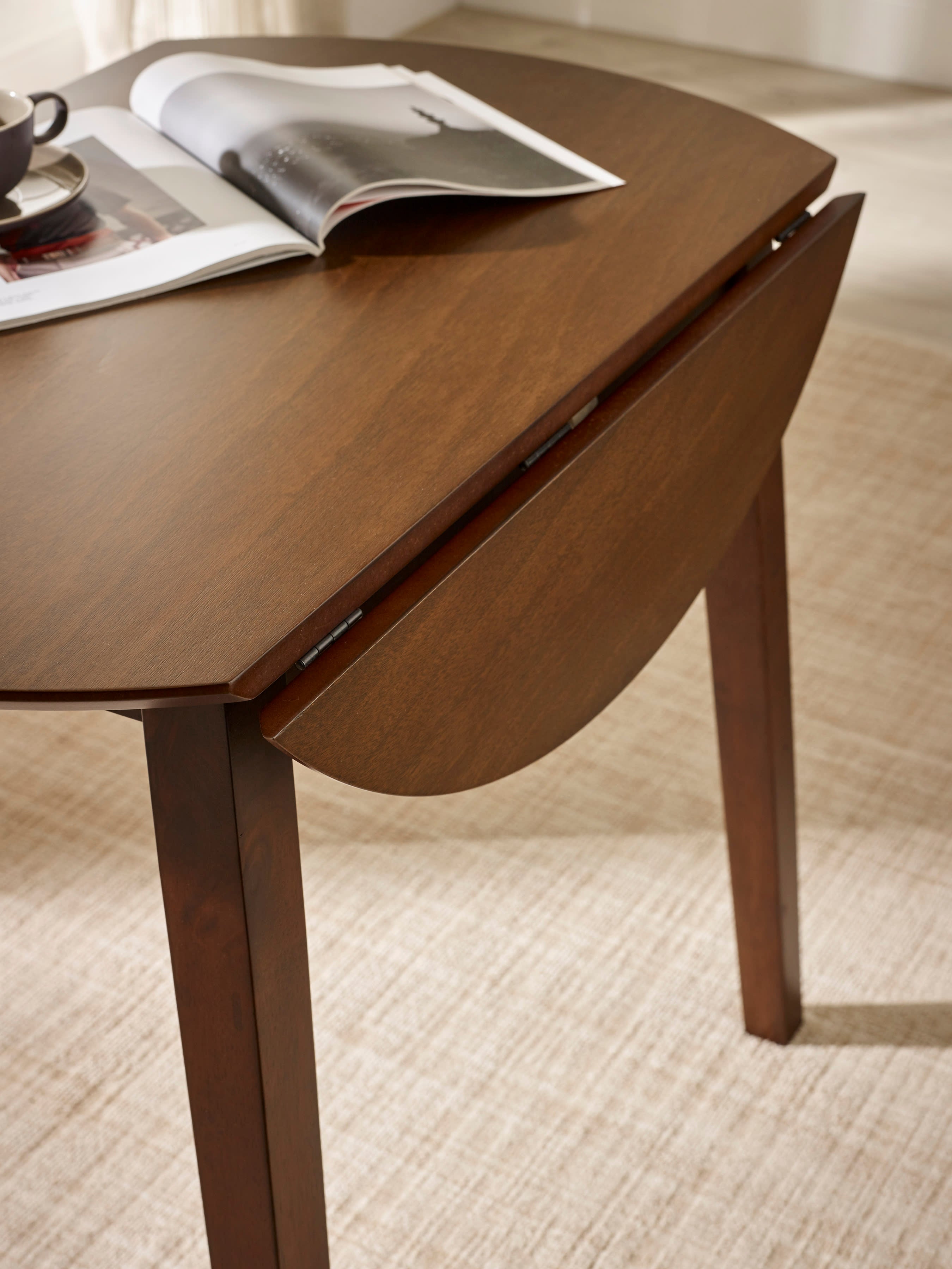 Coast Walnut 55- Drop Leaf Extending Round Dining Table – Walnut Effect